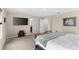 Spacious bedroom with plush carpeting and neutral walls, offering a relaxing retreat at 872 Griffon Ave, Lake Alfred, FL 33850
