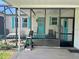 Inviting screened-in porch area provides extra living space and is ideal for relaxing and entertaining at 902 Rose Ln, Lady Lake, FL 32159
