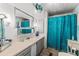 Bathroom with vanity, decorative wall art, and a shower/tub combination at 10 Cocos Plumosa Dr, Eustis, FL 32726