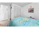 Bright bedroom with closet and unique, colorful decor that creates a welcoming ambiance at 10 Cocos Plumosa Dr, Eustis, FL 32726