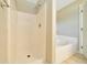 Bathroom featuring glass shower and soaking tub at 10331 Sw 45Th Ave, Ocala, FL 34476