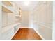 Walk-in closet with built-in shelves and drawers at 10331 Sw 45Th Ave, Ocala, FL 34476