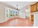 Dining area with bay window and hardwood floors at 10331 Sw 45Th Ave, Ocala, FL 34476