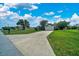 Charming single-story home with a long driveway and well-manicured lawn in the front yard at 10331 Sw 45Th Ave, Ocala, FL 34476