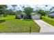 Inviting single-story home features a lush green lawn and well-maintained landscaping at 10331 Sw 45Th Ave, Ocala, FL 34476