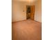 Bedroom featuring neutral colored carpet flooring and trim at 11532 Beaman Cir, Clermont, FL 34711