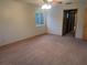 Bedroom featuring neutral carpet and a window at 11532 Beaman Cir, Clermont, FL 34711