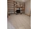 Living room features stone fireplace and built-in bookshelves at 11532 Beaman Cir, Clermont, FL 34711