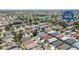 Panoramic aerial view of the neighborhood with lush landscaping and community amenities at 1334 Hollyberry Pl, The Villages, FL 32162