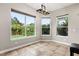 Breakfast nook with large windows offering backyard views at 1444 Whitney Isles Dr, Windermere, FL 34786