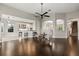Open-concept living area seamlessly connects to the kitchen, enhanced by modern finishes at 1444 Whitney Isles Dr, Windermere, FL 34786