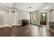 Open-concept living room with hardwood floors and natural light at 1444 Whitney Isles Dr, Windermere, FL 34786