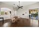 Bright, open living room with hardwood floors and sliding glass doors at 1444 Whitney Isles Dr, Windermere, FL 34786