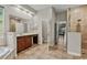 Open main bathroom with a large vanity, walk in shower, and garden tub at 1444 Whitney Isles Dr, Windermere, FL 34786