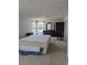 Large bedroom with lots of space and big windows with a view of nature at 149 Roseling Xing, Davenport, FL 33897