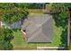 Aerial view of the house showcasing the roof and surrounding landscape at 1702 Hoofprint Ct, Fruitland Park, FL 34731
