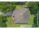 Aerial view of the house showcasing the roof and surrounding landscape at 1702 Hoofprint Ct, Fruitland Park, FL 34731