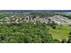 Aerial view of the location of the house in a developed community at 1702 Hoofprint Ct, Fruitland Park, FL 34731