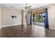 Bedroom with dark hardwood floors, a ceiling fan, and sliding glass doors to the patio at 1892 Sanderling Dr, Clermont, FL 34711