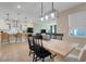 Dining room next to kitchen, illuminated with decorative lighting, offers plenty of natural light at 2161 Gold Dust Dr, Minneola, FL 34715