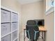 Cozy office space featuring shelving, a desk and a comfy chair at 2161 Gold Dust Dr, Minneola, FL 34715