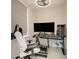 An office with a large monitor, racing chair and simulation equipment at 2161 Gold Dust Dr, Minneola, FL 34715