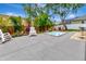 Enjoy the outdoors with this charming backyard featuring a built in hot tub, patio and lush landscaping at 233 Largovista Dr, Oakland, FL 34787