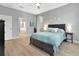 Cozy bedroom featuring a comfortable bed and ensuite bathroom at 233 Largovista Dr, Oakland, FL 34787