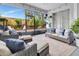 Relaxing sunroom offers plenty of seating and a view of the private, landscaped backyard and pool at 233 Largovista Dr, Oakland, FL 34787