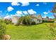 Attractive single-Gathering home with landscaped front yard and two-car garage at 2450 Merida Cir, The Villages, FL 32162