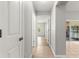 Hallway view to bedroom and lanai at 2450 Merida Cir, The Villages, FL 32162