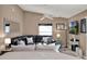 Cozy living room featuring a comfortable sofa, a ceiling fan, and neutral wall color at 25400 Waterbrook Ct, Leesburg, FL 34748