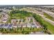 Aerial view displaying residential homes in a neighborhood setting near main roads and green spaces at 2755 Bobcat Chase Blvd, Oakland, FL 34787