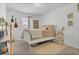 Bright bedroom with a comfortable bed, a side table and natural light at 2755 Bobcat Chase Blvd, Oakland, FL 34787