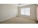 Bright bedroom featuring a ceiling fan and a window offering natural light at 2880 Manor Downs, The Villages, FL 32162