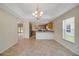 View of kitchen and dining area with tile flooring and stainless appliances at 2880 Manor Downs, The Villages, FL 32162