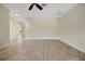Open living room with tile floors and lots of space at 2880 Manor Downs, The Villages, FL 32162