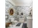 Bathroom features toile wallpaper, classic fixtures, and a decorative vanity sink at 32511 County Road 437, Sorrento, FL 32776