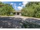 Charming home featuring a stone pathway leading to a covered front porch with classic columns at 32511 County Road 437, Sorrento, FL 32776