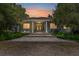 Charming home featuring a stone pathway leading to a covered front porch with classic columns at 32511 County Road 437, Sorrento, FL 32776