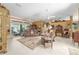 Inviting living room featuring a comfortable seating arrangement and views of other rooms at 32511 County Road 437, Sorrento, FL 32776