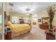 Spacious main bedroom with large windows and en-suite bathroom access at 32511 County Road 437, Sorrento, FL 32776