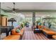 Spacious covered patio with comfortable seating, perfect for outdoor entertaining at 32511 County Road 437, Sorrento, FL 32776