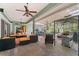 Open air patio with seating, a grill, and a great view of the backyard at 32511 County Road 437, Sorrento, FL 32776