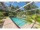Inviting screened pool with beautiful patio, creating a perfect outdoor retreat at 32511 County Road 437, Sorrento, FL 32776