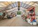 Bright and airy workshop with high ceilings, natural light, and versatile space for various activities at 32511 County Road 437, Sorrento, FL 32776