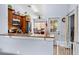 View into the kitchen with granite countertops, stainless steel appliances, and a breakfast bar at 3309 Paisley Cir, Orlando, FL 32817