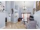 Inviting living room featuring high ceilings, tile flooring, and a view into the adjacent living spaces at 3309 Paisley Cir, Orlando, FL 32817