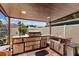 Outdoor kitchen featuring stainless steel appliances, ample counter space, and a built-in grill at 3309 Paisley Cir, Orlando, FL 32817