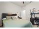 Bedroom featuring a ceiling fan, desk and a well lit view at 3467 Buoy Cir, Winter Garden, FL 34787